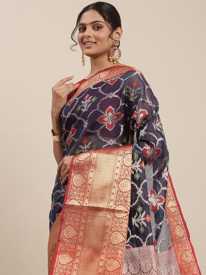 Faishana Presents Presents Navy Blue Zari Patola Contrast Zari Brocade Maroon Pattu Border Banarasi Saree.