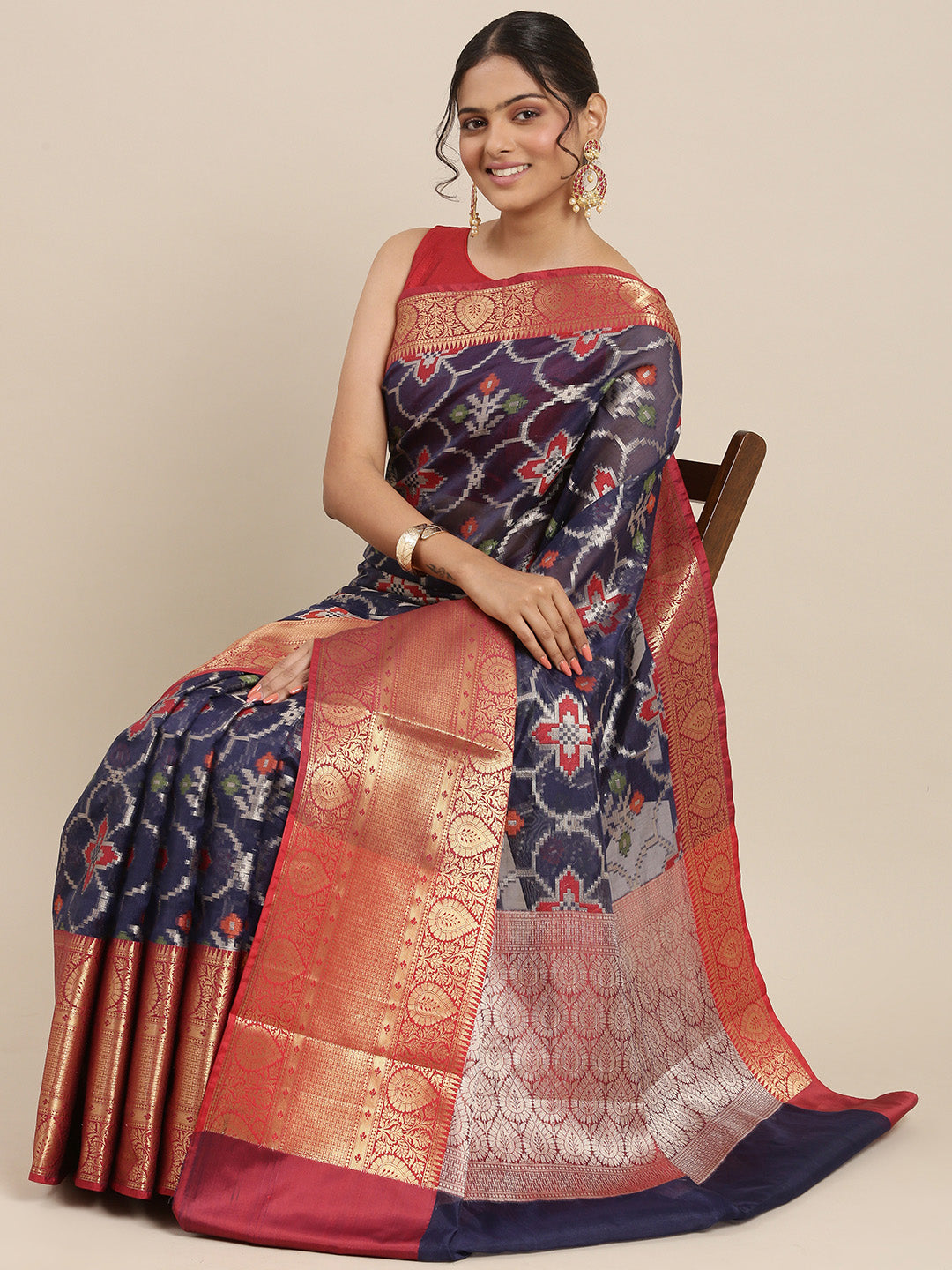 Faishana Presents Presents Navy Blue Zari Patola Contrast Zari Brocade Maroon Pattu Border Banarasi Saree.