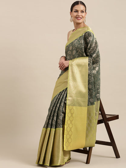 Faishana Presents Presents Bottle Green Zari Patan Patola Contrast Zari Brocade Pistachio Pattu Border Banarasi Saree.