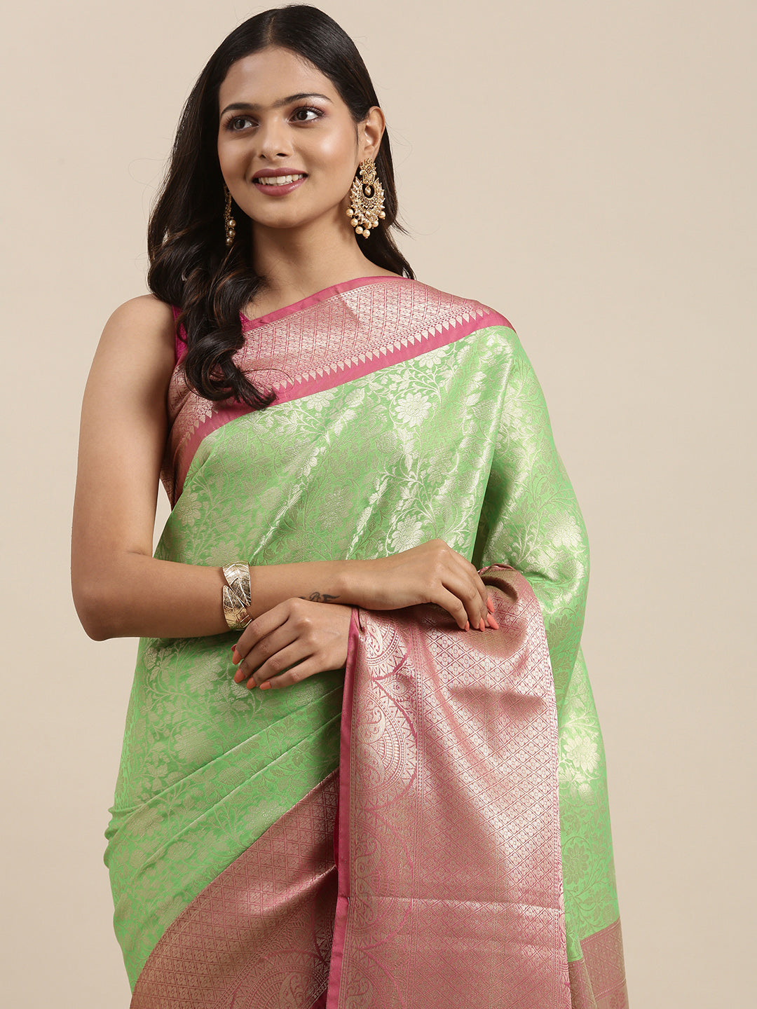 Faishana Presents Presents Green Kanchi Silk Zari Brocade Contrast Zari Brocade Pink Pattu Border Banarasi Saree.