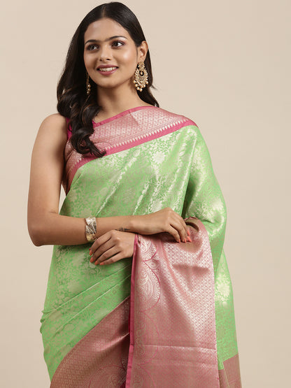 Faishana Presents Presents Green Kanchi Silk Zari Brocade Contrast Zari Brocade Pink Pattu Border Banarasi Saree.