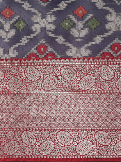 Faishana Presents Presents Navy Blue Zari Patola Contrast Zari Brocade Maroon Pattu Border Banarasi Saree.