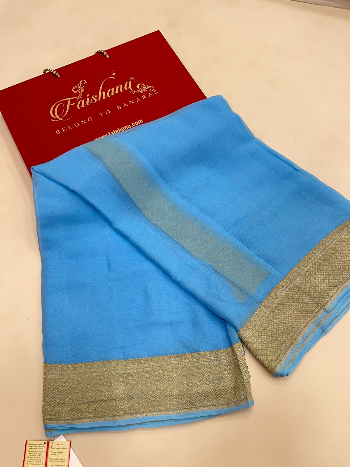 Faishana Pure Silk Handloom Sky Blue Khaddi Georgette Kadhwa Pallu with Banarasi Kadhwa Gold Zari Border Saree