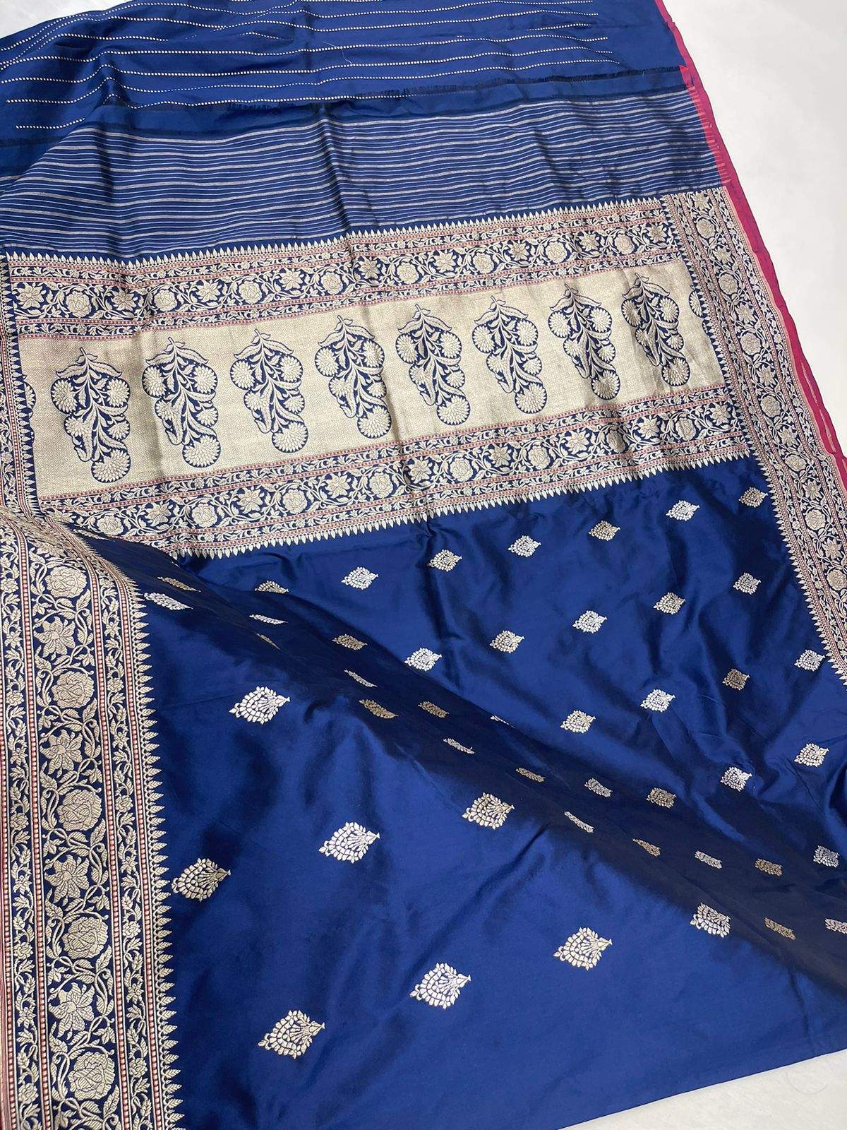 Regal Elegance: Faishana's Pure Silk Handloom Katan Navy Blue Saree with Silver-Gold Booti and Kadhwa Zari Border Paired with Navy Blue Kadhwa Blouse