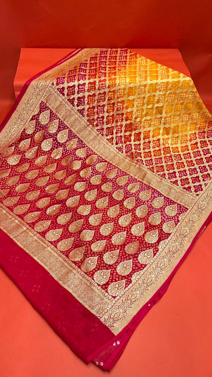 Sunset Splendor: Faishana's Vibrant 2D Yellow and Orange Katan Georgette Bandhej Zari Kadhwa Jaal Chunri Booti with Kadhwa Contrasting Red Pallu and Blouse Saree