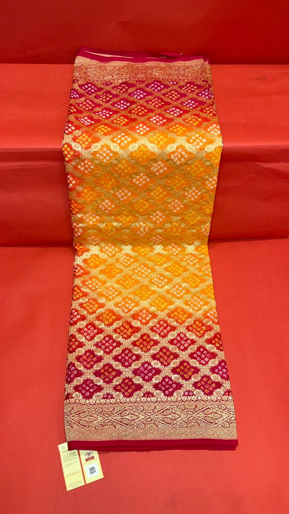 Sunset Splendor: Faishana's Vibrant 2D Yellow and Orange Katan Georgette Bandhej Zari Kadhwa Jaal Chunri Booti with Kadhwa Contrasting Red Pallu and Blouse Saree
