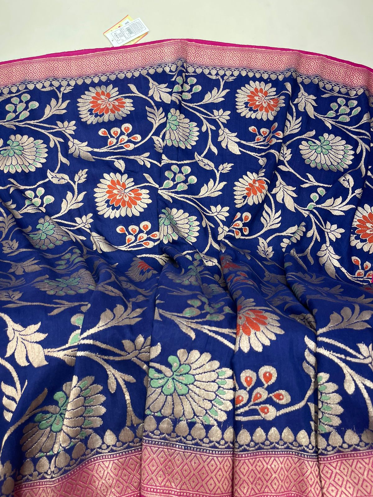 Faishana's Elegance in Bloom: Pure Silk Handloom Navy Blue Floral Mina Jaal Khaddi Georgette Saree with Pink Kadhwa Anchal & Blouse