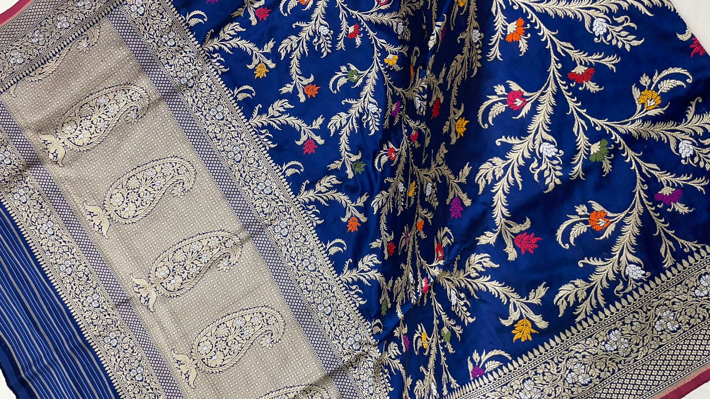 Symphony of Elegance and Tradition: Faishana Pure Handloom Navy Blue Katan Silk Multicolor Minakari Kadhwa Jaal and Zari Border with Navy Stripe Blouse