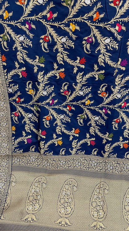 Symphony of Elegance and Tradition: Faishana Pure Handloom Navy Blue Katan Silk Multicolor Minakari Kadhwa Jaal and Zari Border with Navy Stripe Blouse