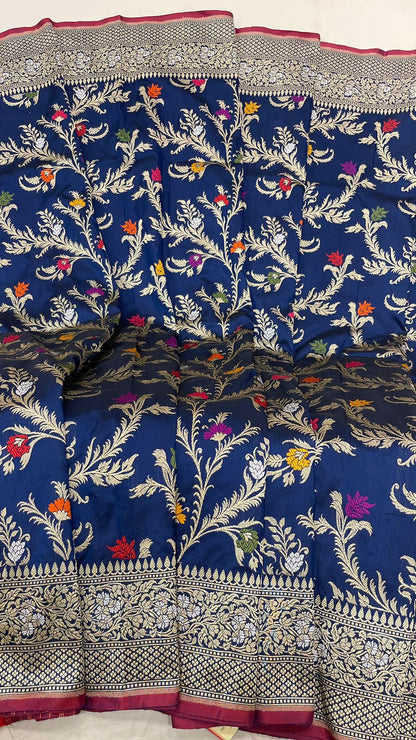 Symphony of Elegance and Tradition: Faishana Pure Handloom Navy Blue Katan Silk Multicolor Minakari Kadhwa Jaal and Zari Border with Navy Stripe Blouse
