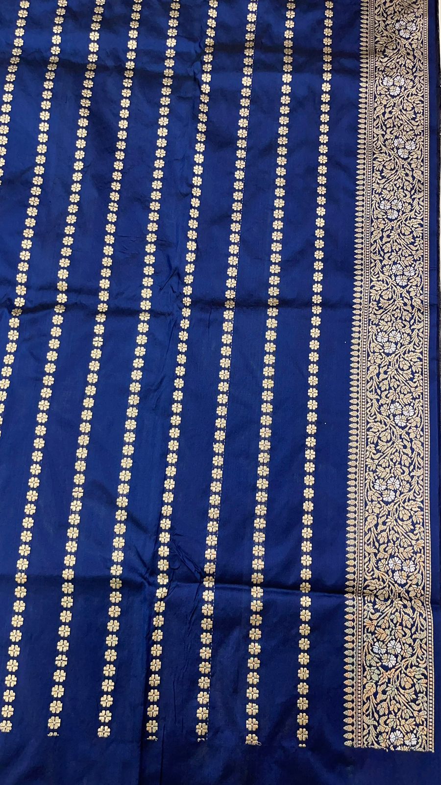 Symphony of Elegance and Tradition: Faishana Pure Handloom Navy Blue Katan Silk Multicolor Minakari Kadhwa Jaal and Zari Border with Navy Stripe Blouse