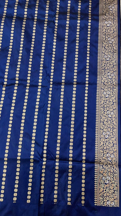 Symphony of Elegance and Tradition: Faishana Pure Handloom Navy Blue Katan Silk Multicolor Minakari Kadhwa Jaal and Zari Border with Navy Stripe Blouse