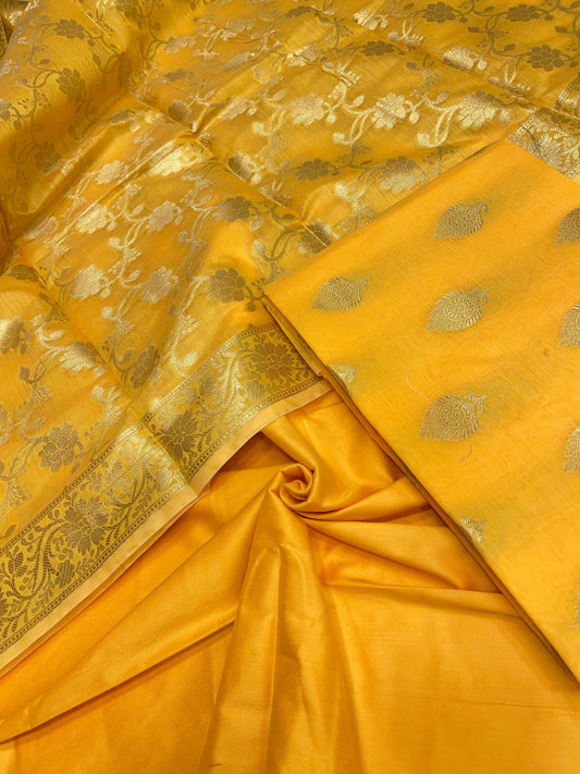 Yellow cotton suit set with floral zari bootis and matching dupatta. SHL_70