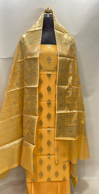 Yellow cotton suit set with floral zari bootis and matching dupatta. SHL_70