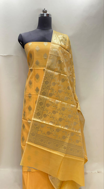 Yellow cotton suit set with floral zari bootis and matching dupatta. SHL_70