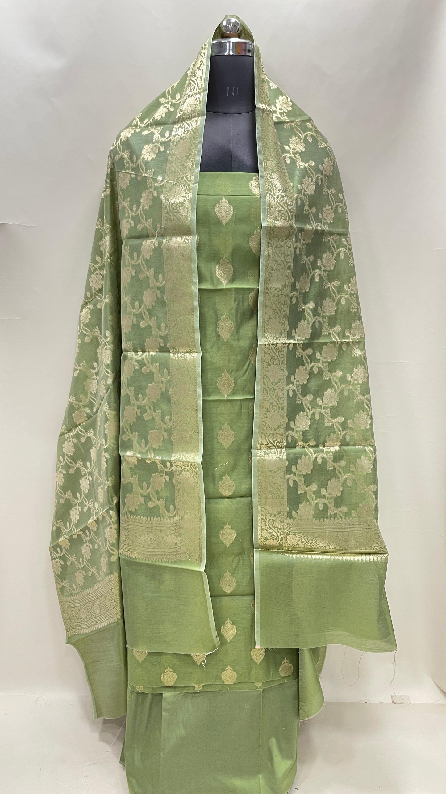 Green cotton suit set with floral zari bootis and yellow dupatta. SHL_71
