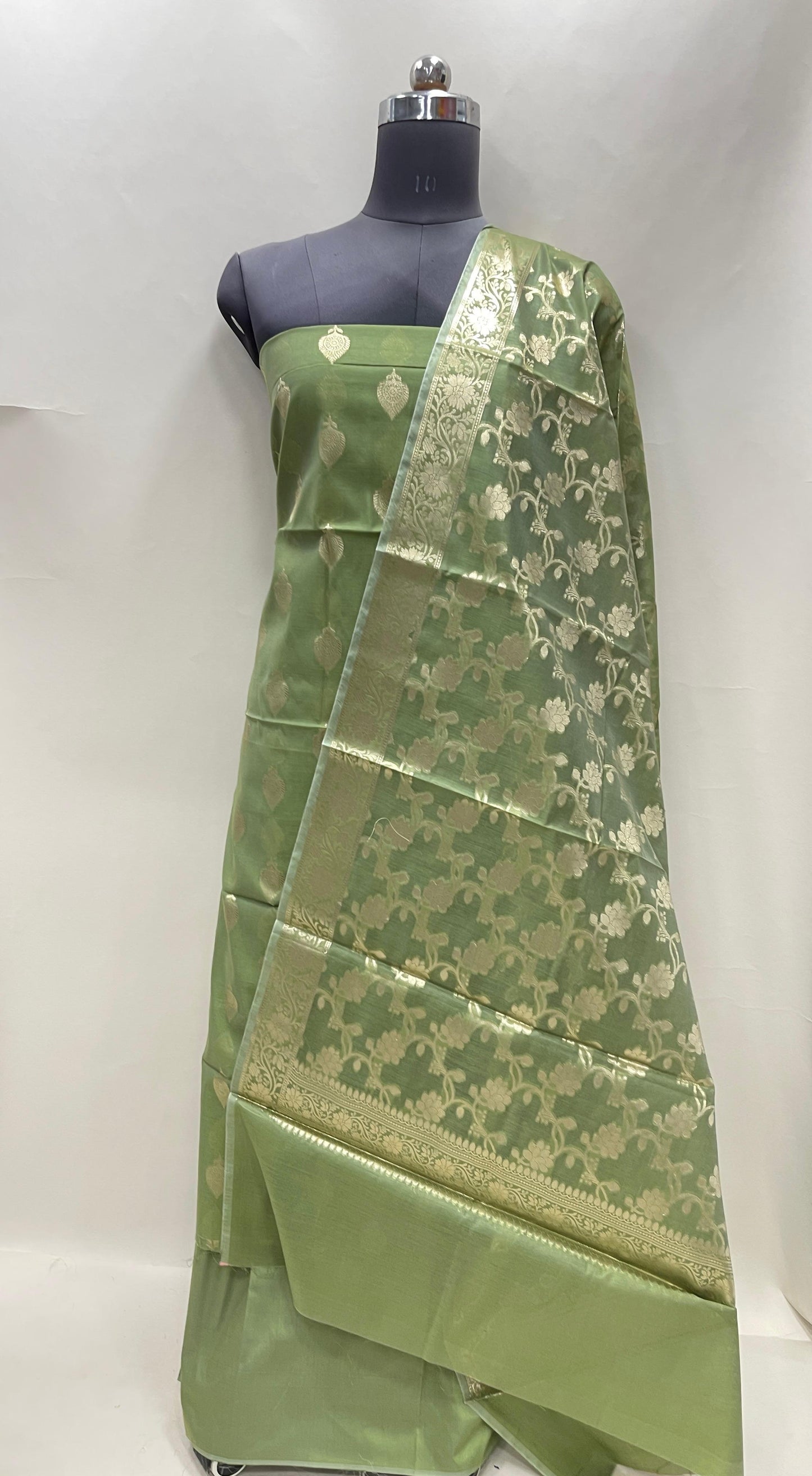 Green cotton suit set with floral zari bootis and yellow dupatta. SHL_71