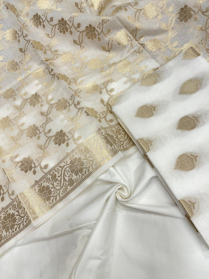 White cotton suit set with floral zari bootis and yellow dupatta. SHL_72