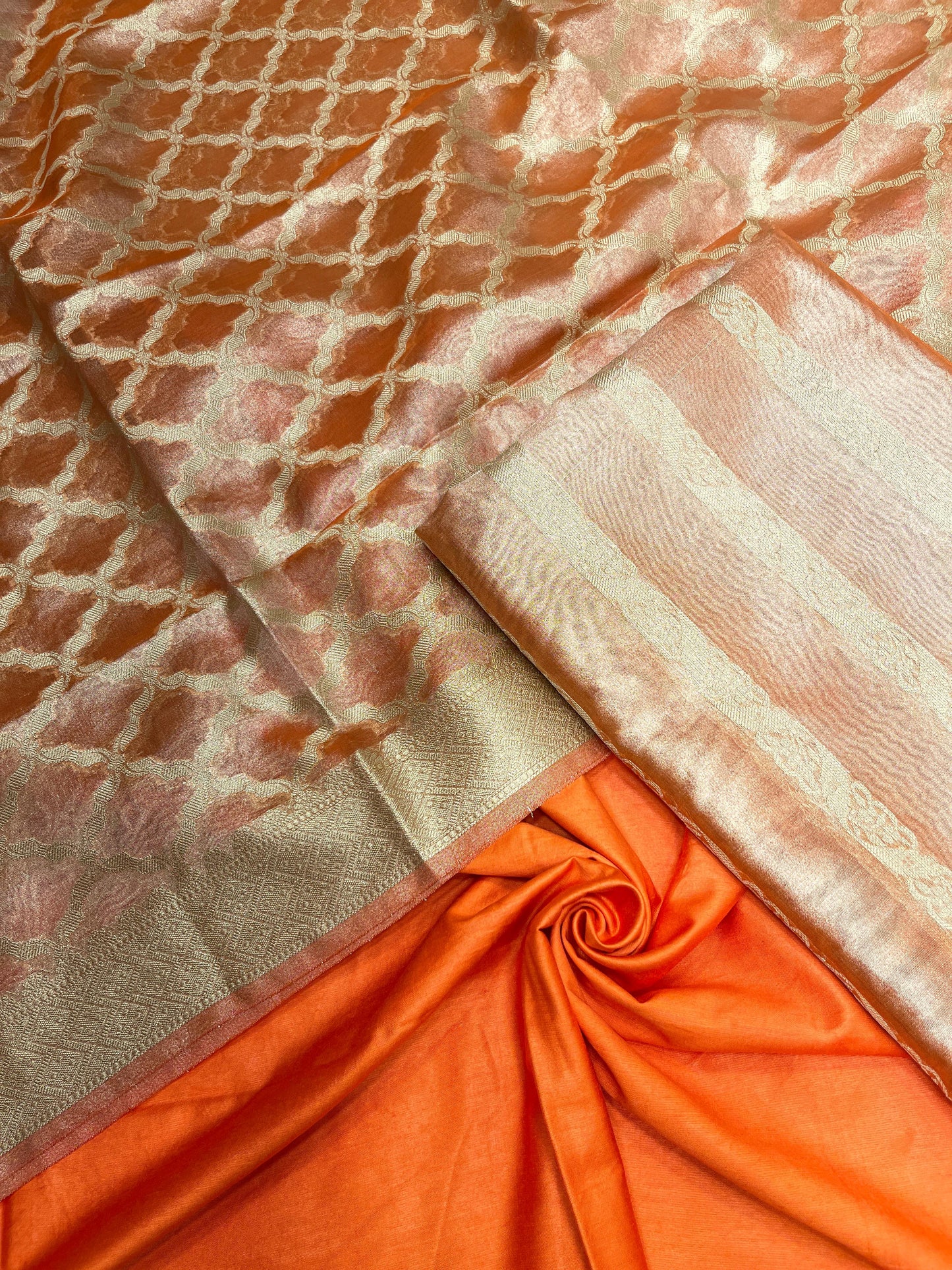 Orange tissue silk suit set with floral zari stripe and carry dupatta. SHL_75