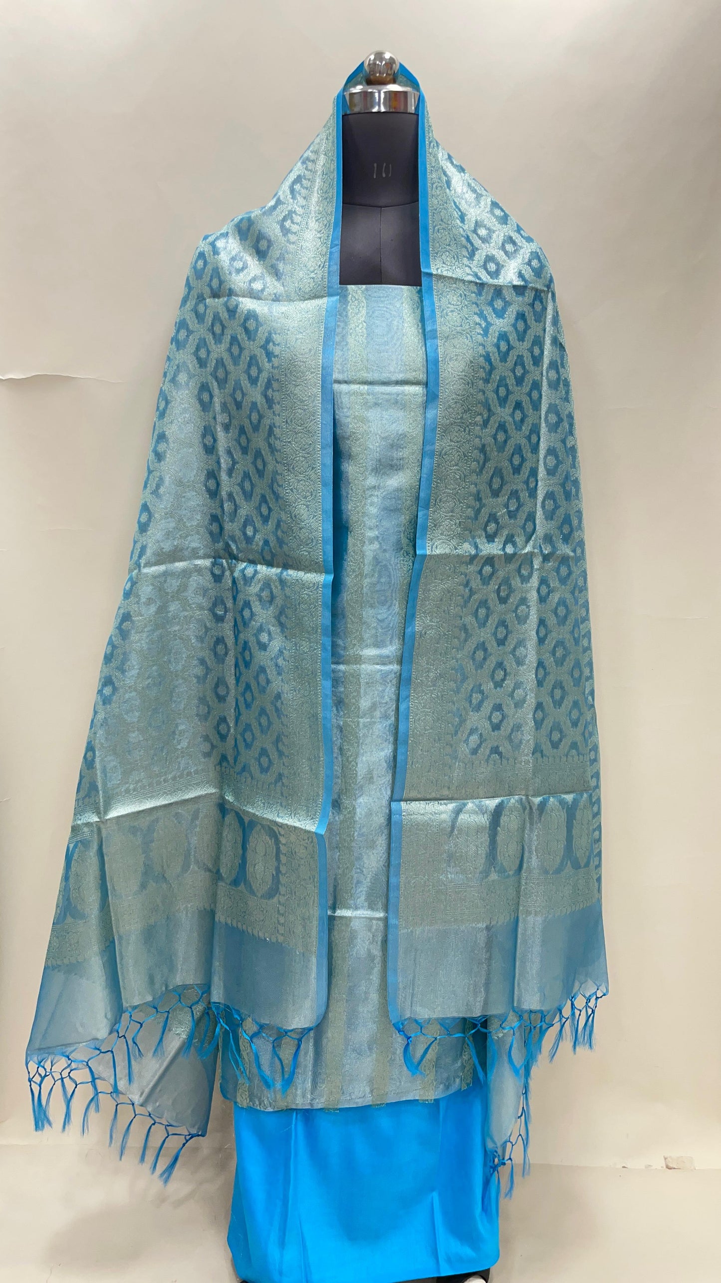 Sky blue tissue silk suit set with floral zari stripe and carry dupatta. SHL_77