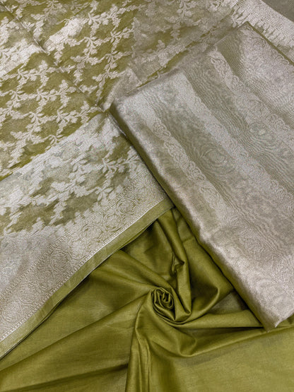 Green tissue silk suit set with floral zari stripe and green dupatta. SHL_79