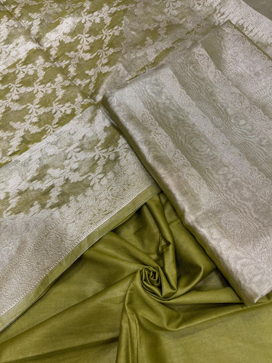 Green tissue silk suit set with floral zari stripe and green dupatta. SHL_79