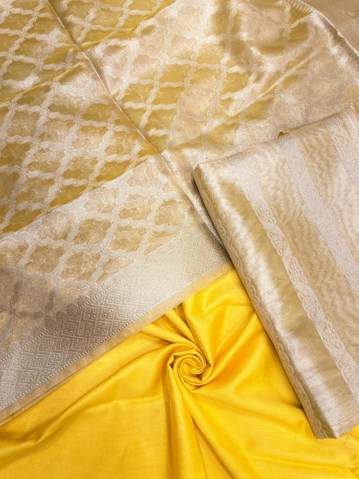 Yellow tissue silk suit with floral zari stripe, plain bottom, and jaal dupatta. SHL_81