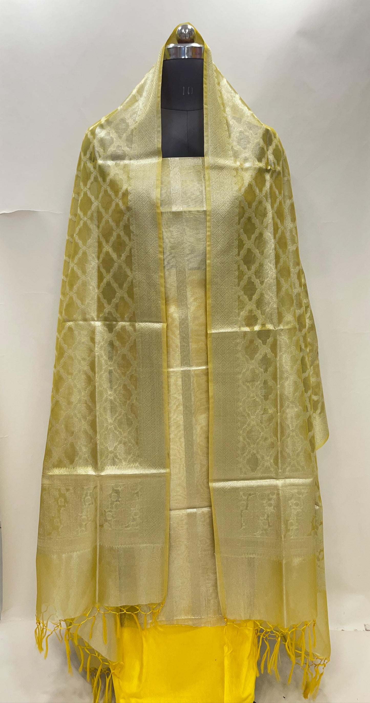 Yellow tissue silk suit with floral zari stripe, plain bottom, and jaal dupatta. SHL_81