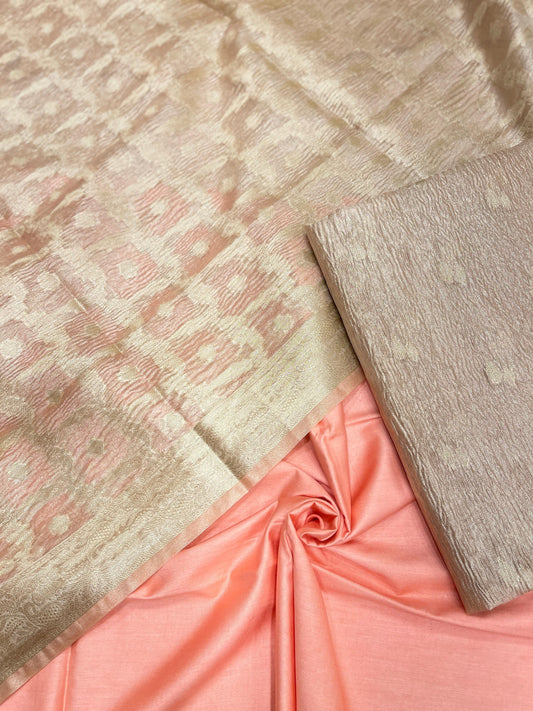 Peach tissue suit with floral zari booti, plain bottom, and checkered dupatta. SHL_82