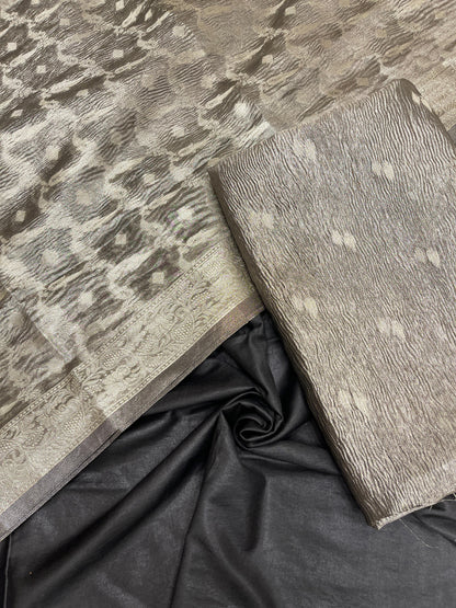 Black tissue suit with floral zari booti, plain bottom, and checkered dupatta. SHL_85