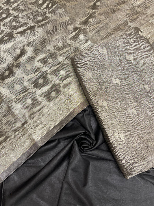 Black tissue suit with floral zari booti, plain bottom, and checkered dupatta. SHL_85