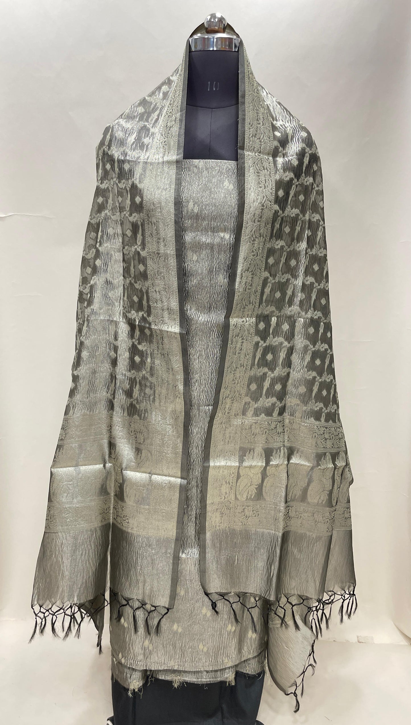 Black tissue suit with floral zari booti, plain bottom, and checkered dupatta. SHL_85
