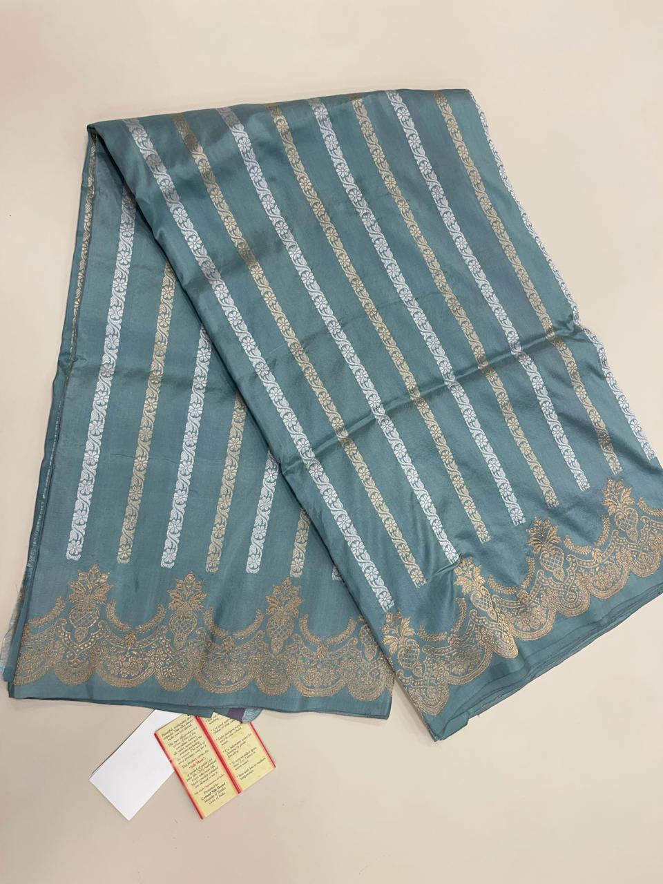 Faishana Pure Silk Handloom Grey Katan Silk Sona Rupa Zari Kadhwa Strip with Kadhwa Zari Border and Grey Blouse