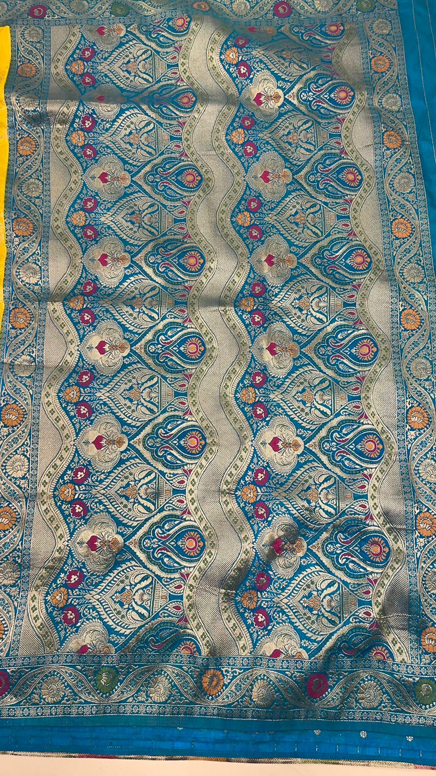 Faishana Presents Yellow Dupion Silk Floral Mina Zari Jaal with Contrast Sky Blue Paithani Mina Zari Pallu Zari Border and Sky Blue Blouse