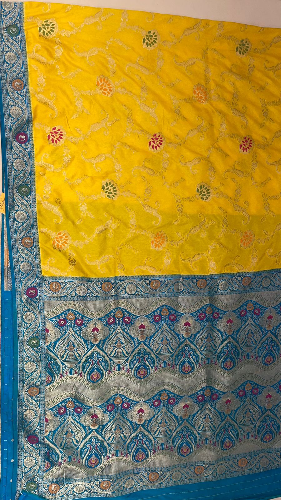 Faishana Presents Yellow Dupion Silk Floral Mina Zari Jaal with Contrast Sky Blue Paithani Mina Zari Pallu Zari Border and Sky Blue Blouse