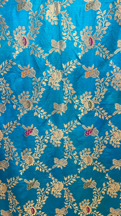 Faishana Presents Sky Blue Dupion Silk Floral Mina Zari Jaal with Contrast Magenta Paithani Mina Zari Pallu Zari Border and Magenta Blouse