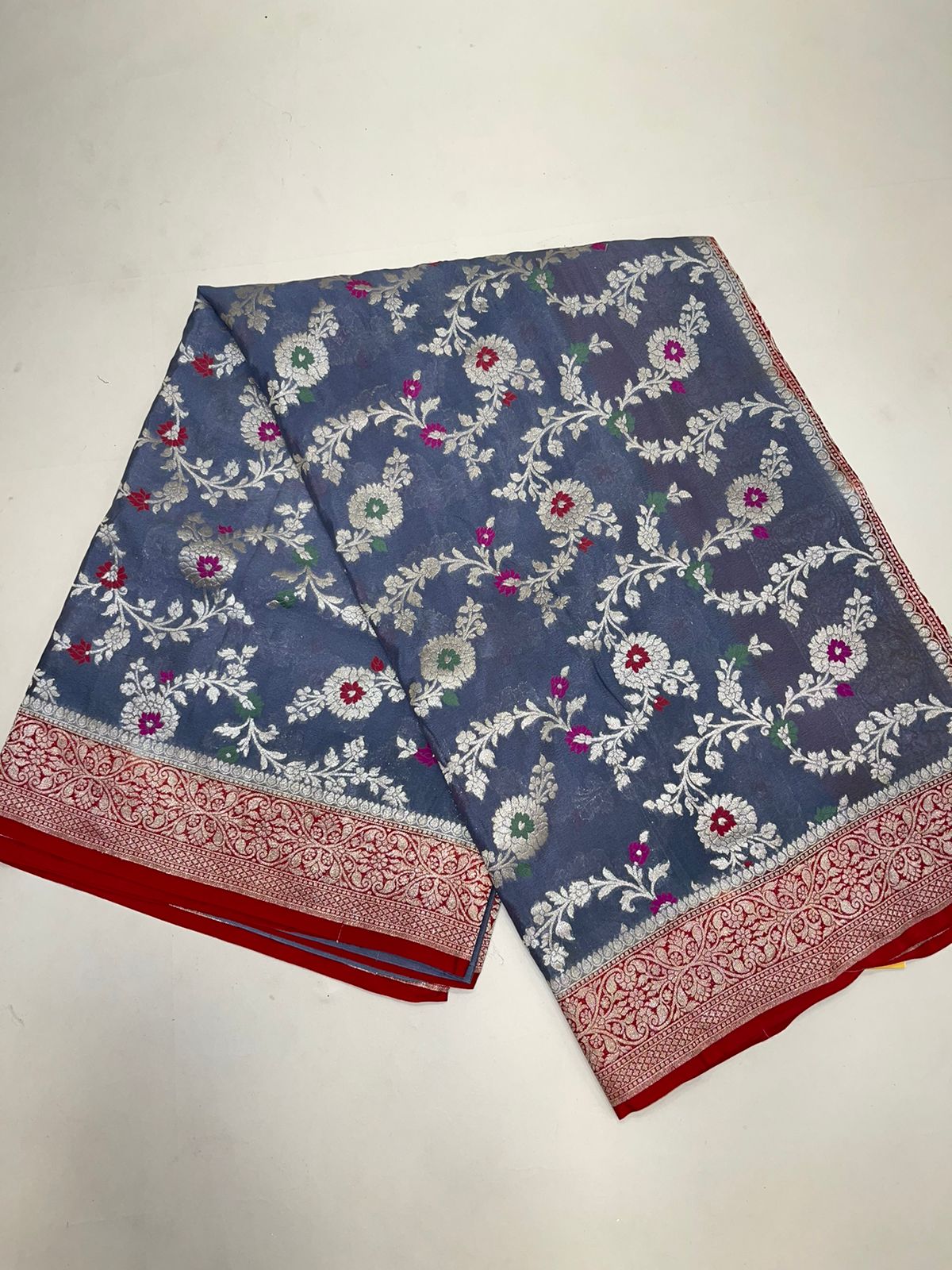 Faishana Presents Grey Khaddi Georgette Floral Minakari Zari Jaal with Contrast Red Banarasi Floral Jaal Pallu Zari Border and Green Blouse