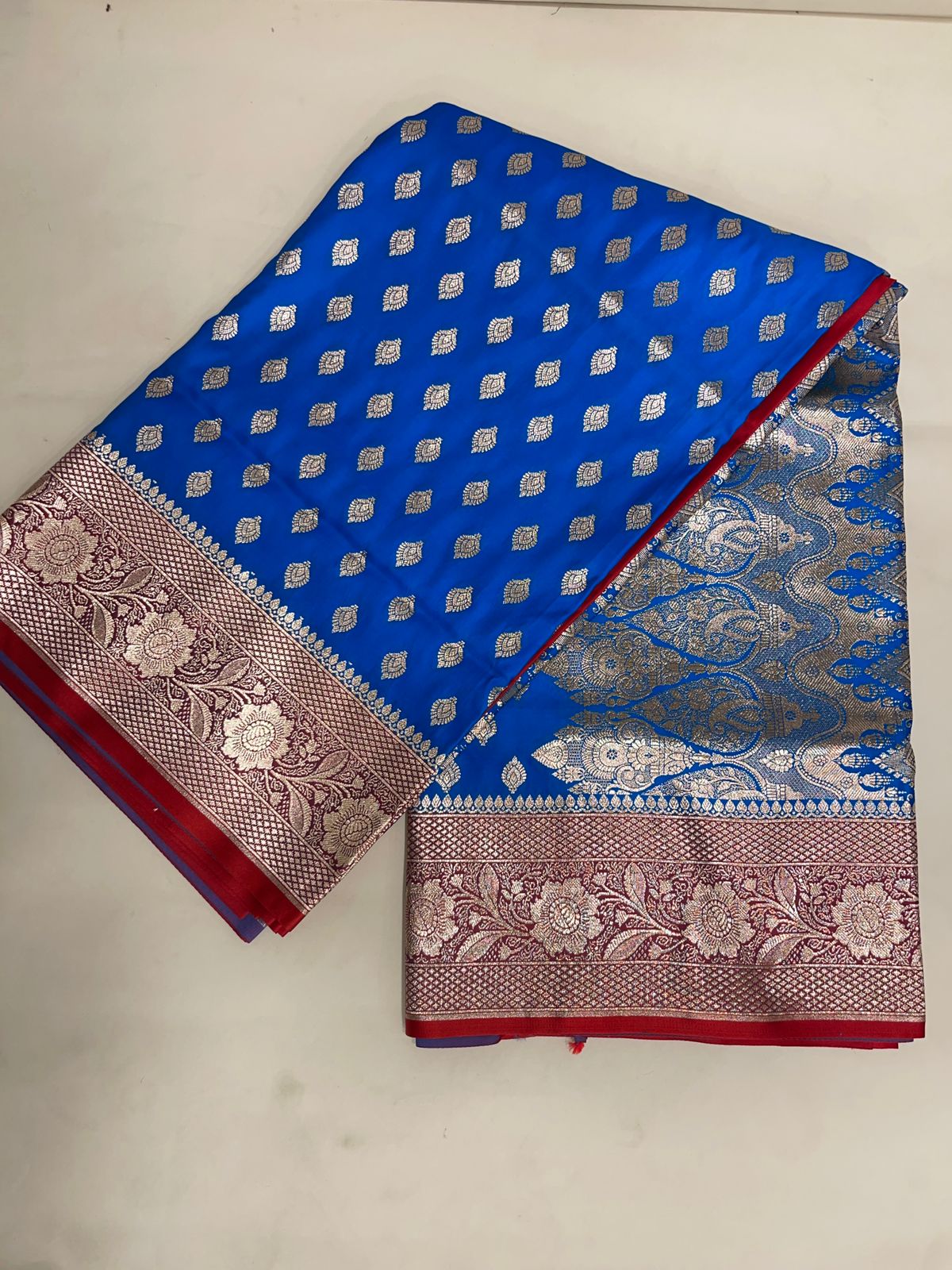 Faishana Presents Blue Katan Silk Floral Zari Booti with Contrast Red 2D Silver Zari Border with Red Blouse
