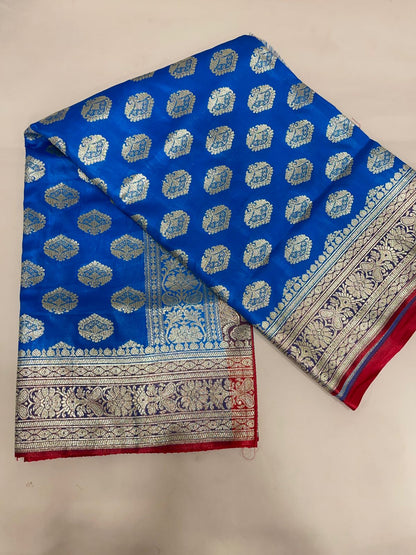 Faishana Presents Blue Satin Silk Silver Zari Floral Boota and Contrast Red Zari Border and Heavy Silver Zari Floral Anchal Banarasi Saree with Red Blouse