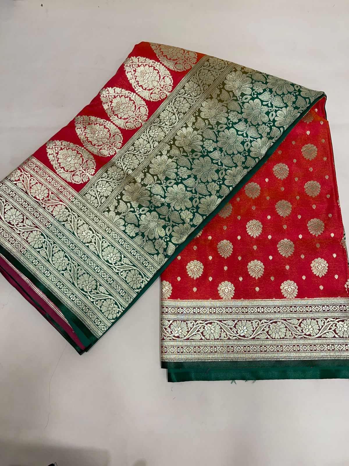 Faishana Presents Orange Satin Silk Zari Booti and Contrast Green 2D Zari Border and Heavy Floral Jaal Pallu Banarasi Saree with Green Blouse