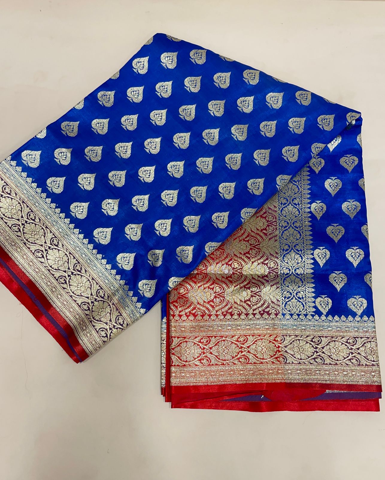 Faishana Presents Blue Satin Silk Silver Zari Pan Booti and Contrast Red Zari Border and Heavy Silver Zari Floral Anchal Banarasi Saree with Red Blouse