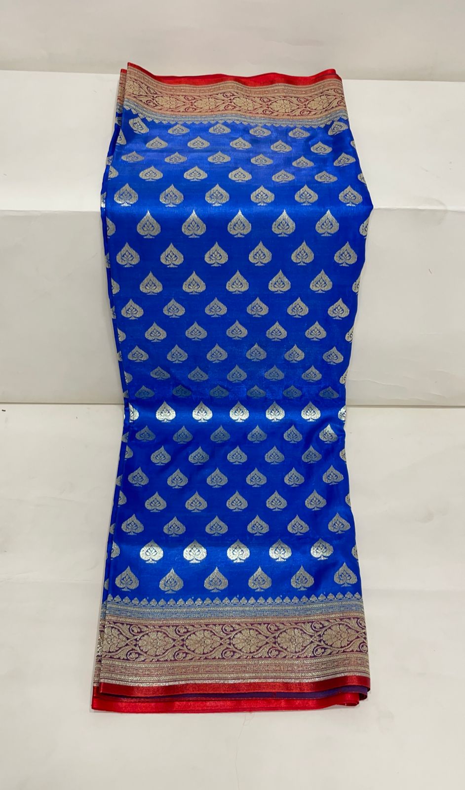 Faishana Presents Blue Satin Silk Silver Zari Pan Booti and Contrast Red Zari Border and Heavy Silver Zari Floral Anchal Banarasi Saree with Red Blouse