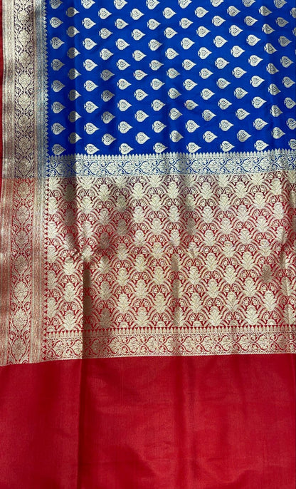 Faishana Presents Blue Satin Silk Silver Zari Pan Booti and Contrast Red Zari Border and Heavy Silver Zari Floral Anchal Banarasi Saree with Red Blouse