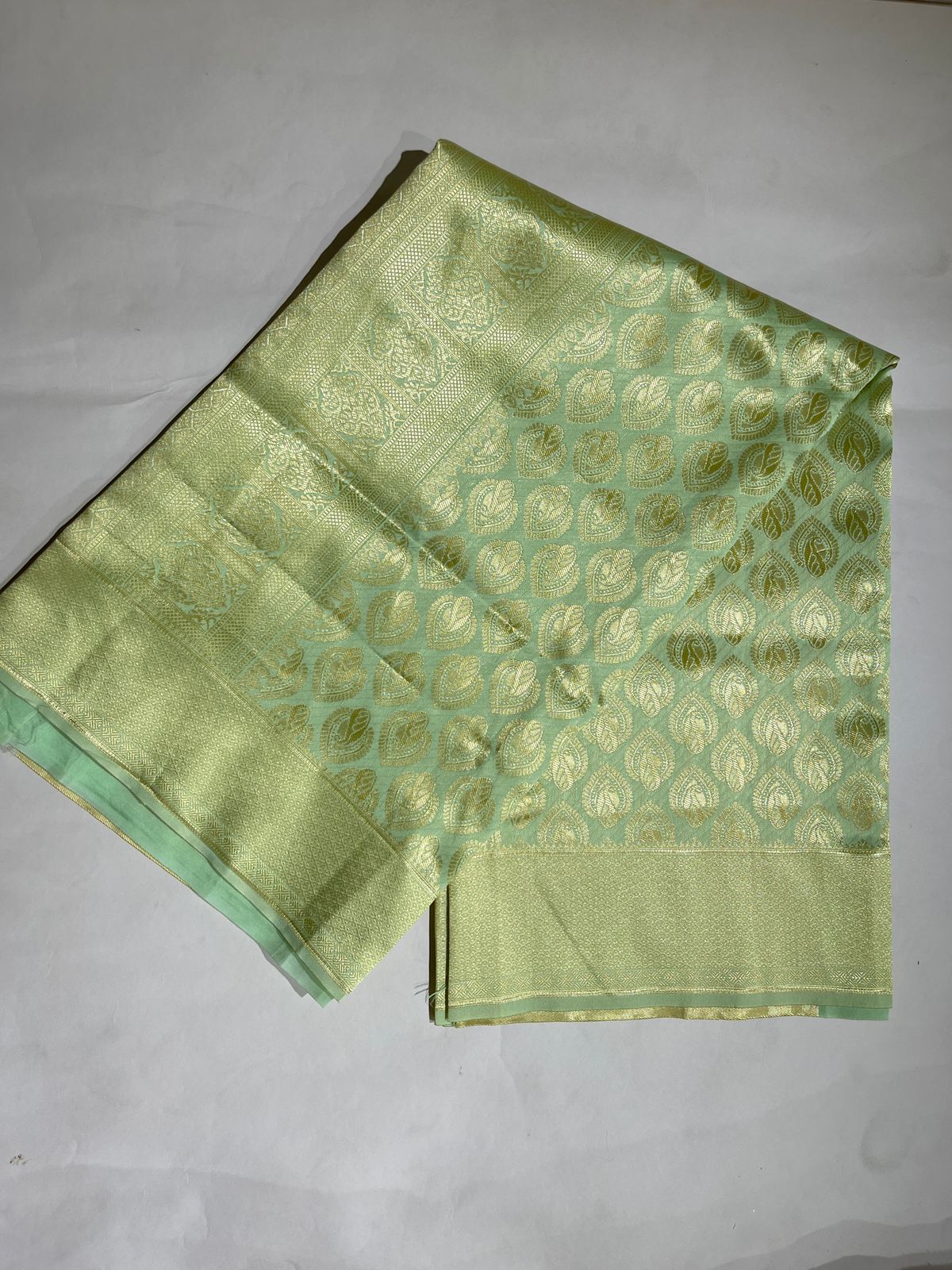 Faishana Presents Light Green Kanjivaram Silk Golden Zari Paisley Boota with Self Zari Border and Light Green Blouse