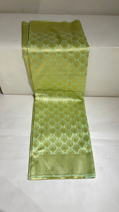 Faishana Presents Light Green Kanjivaram Silk Golden Zari Paisley Boota with Self Zari Border and Light Green Blouse