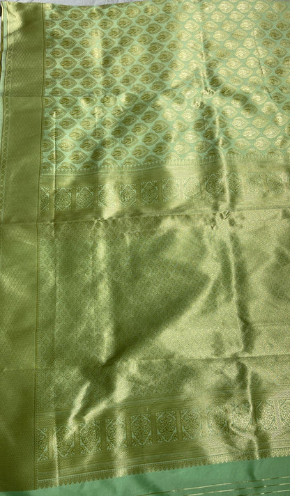 Faishana Presents Light Green Kanjivaram Silk Golden Zari Paisley Boota with Self Zari Border and Light Green Blouse