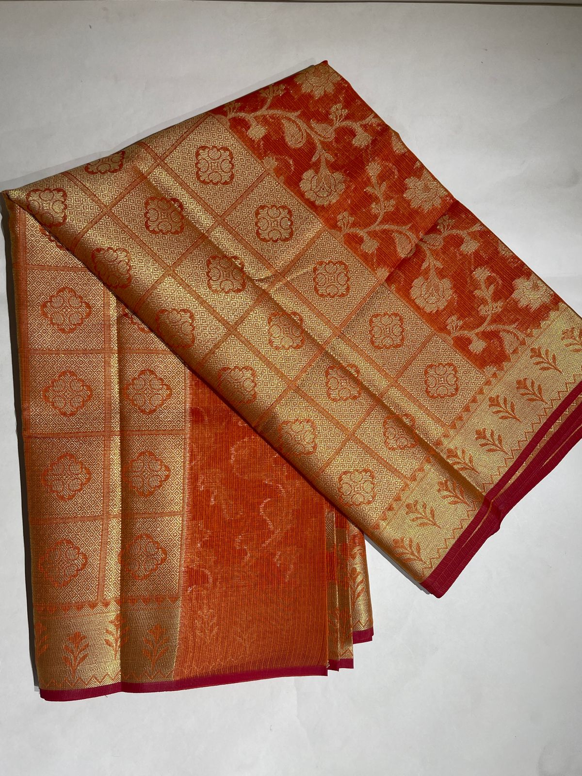 Faishana Presents Orange Tissue Golden Floral Zari Jaal with Checkered Pallu and Orange Blouse