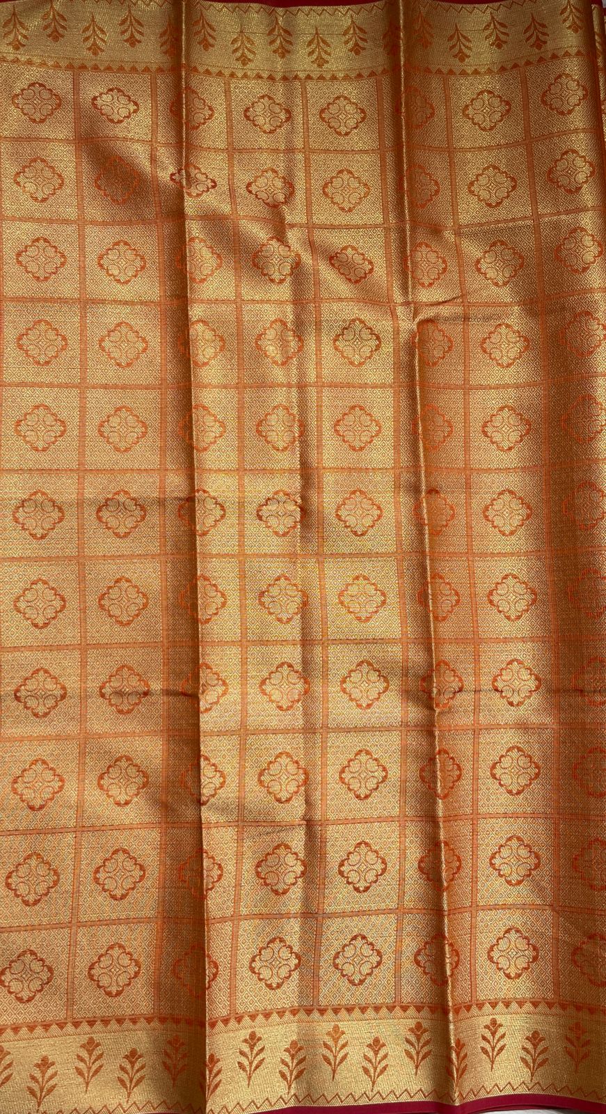 Faishana Presents Orange Tissue Golden Floral Zari Jaal with Checkered Pallu and Orange Blouse