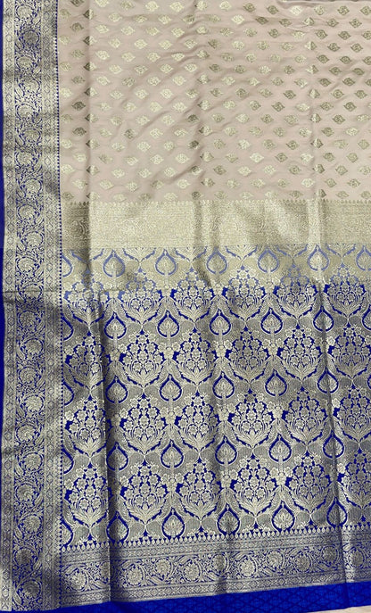 Faishana Presents Off-White Katan Silk Floral Light Gold Zari Booti with Contrast Blue Floral Pallu Banarasi saree and Blue Blouse