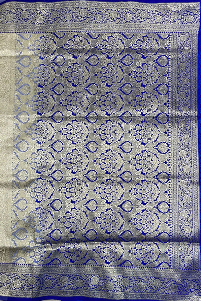 Faishana Presents Off-White Katan Silk Floral Light Gold Zari Booti with Contrast Blue Floral Pallu Banarasi saree and Blue Blouse